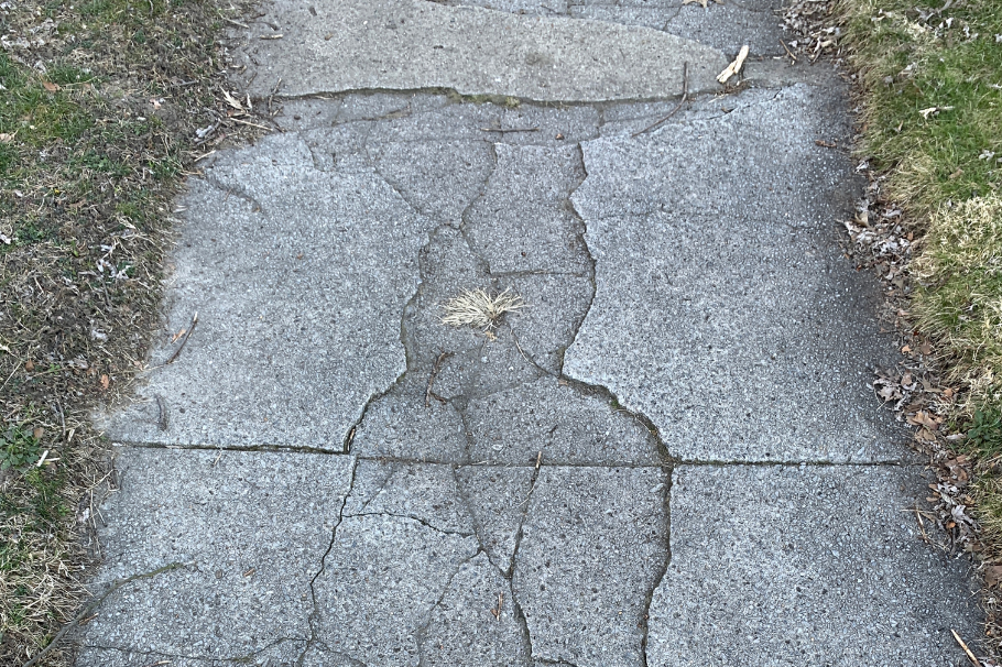Sidewalk slab leveling